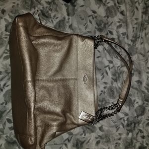 Rose gold coach bag